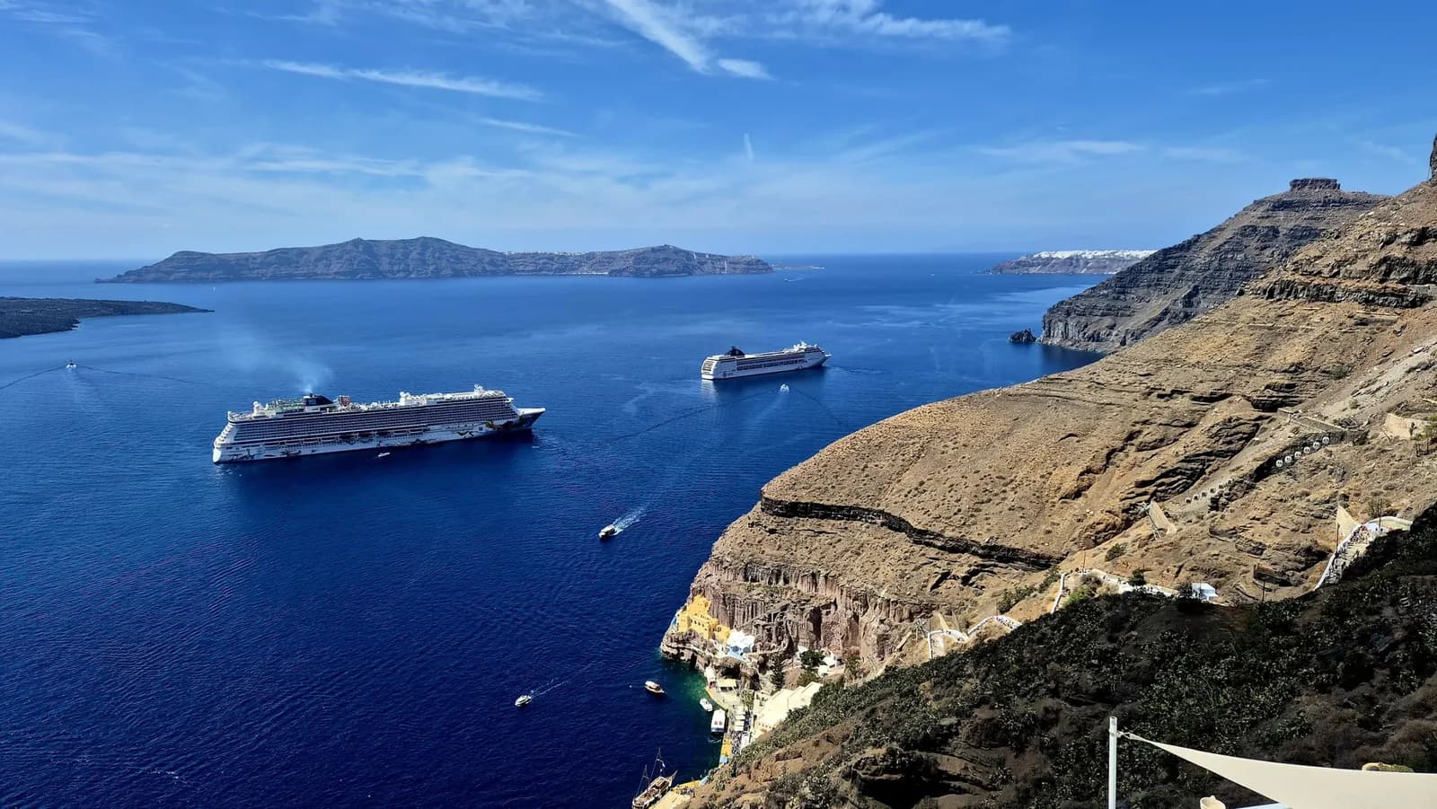 Ships anchored below the cliffs