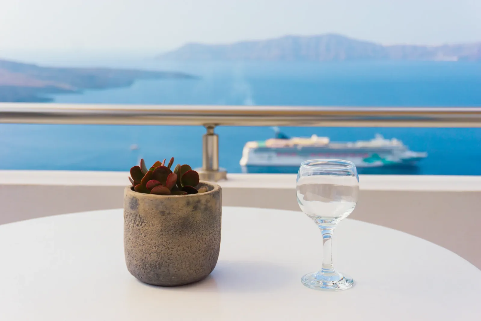 Drinks on the terrace above the sea